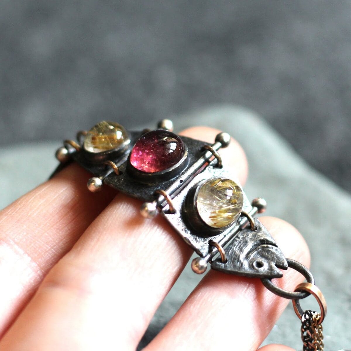 Silver and bronze kinematic fish pendant - Image 4