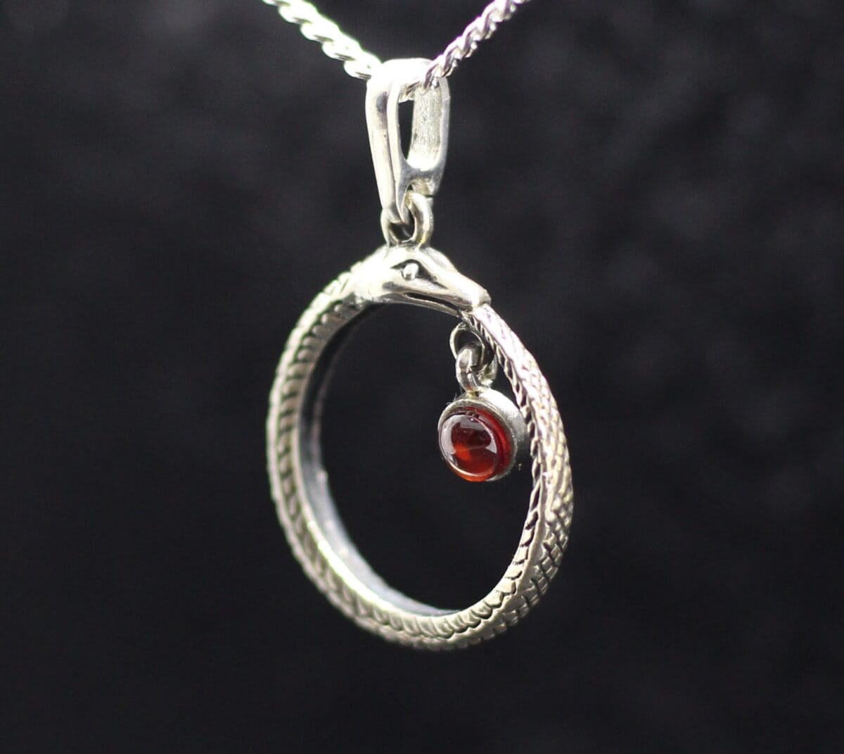 Ouroboros Snake eating tale pendant with stone