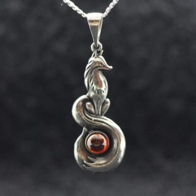 Sitting symbol fox with stone