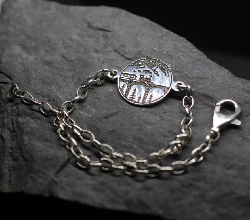 Steam train in mountain silver jewelry bracelet (2) Steam locomotive mountain silver jewelry bracelet. - Image 1